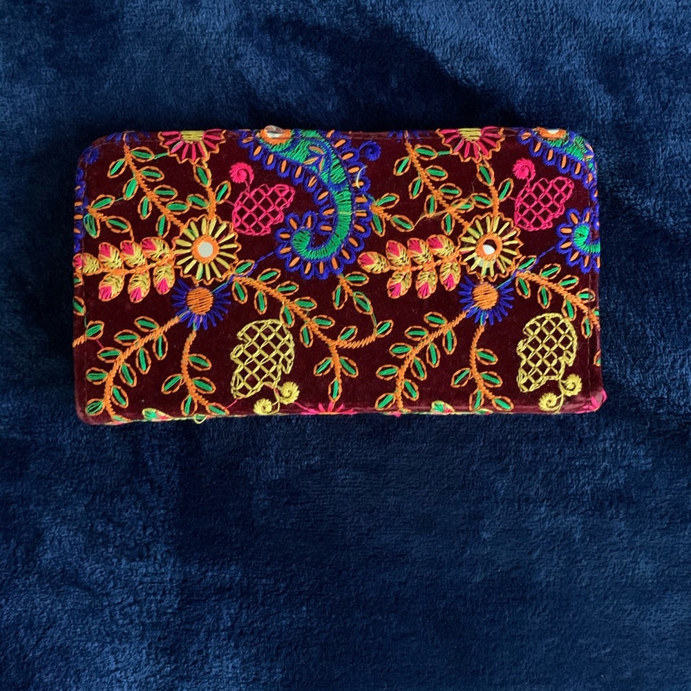Embroidered clutch